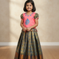 Kids pattu pavadai set with coral pink semi-silk top and teal blue bridal silk skirt by Sri Thulir Tex