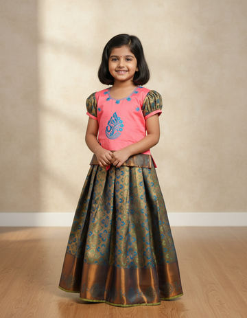 Kids pattu pavadai set with coral pink semi-silk top and teal blue bridal silk skirt by Sri Thulir Tex