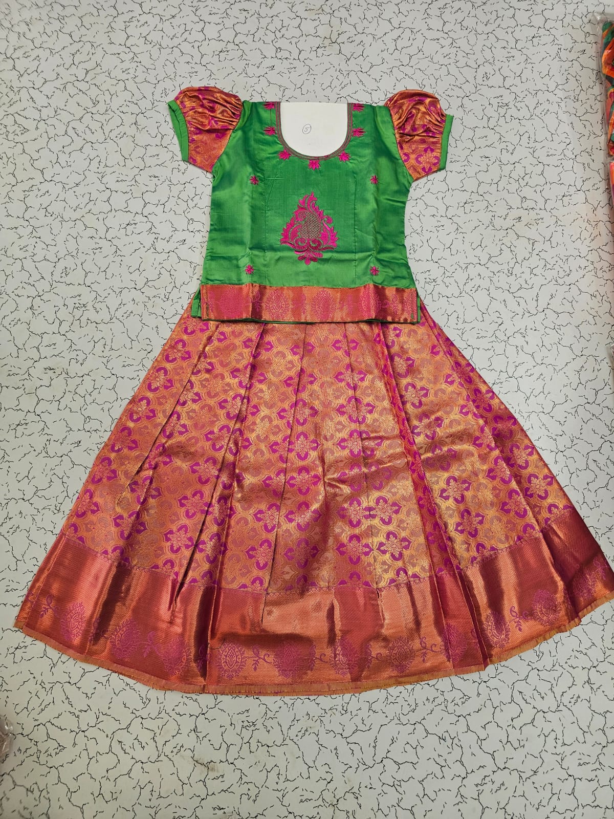 Kids green and pink pattu pavadai set with puff sleeves and zari silk skirt from Sri Thulir Tex