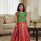 Kids green and pink pattu pavadai set with puff sleeves and zari silk skirt from Sri Thulir Tex