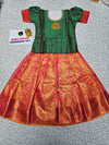 Kids green semi-silk top with pink and gold bridal silk pattu pavadai set by Sri Thulir Tex