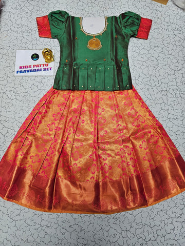 Kids green semi-silk top with pink and gold bridal silk pattu pavadai set by Sri Thulir Tex