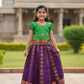 Kids Pattu Pavadai set with green top and purple zari woven skirt from Sri Thulir Tex.