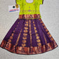 Kids Pattu Pavadai set with green semi-silk top and purple zari embroidered skirt from Sri Thulir Tex.
