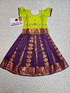 Kids Pattu Pavadai set with green semi-silk top and purple zari embroidered skirt from Sri Thulir Tex.