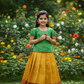 Kids pattu pavadai set with green semi silk top and yellow bridal silk skirt from Sri Thulir Tex