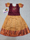 Kids maroon stone work blouse with gold silk pattu pavadai set by Sri Thulir Tex