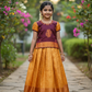 Kids maroon and golden yellow pattu pavadai set with puff sleeves and zari woven silk skirt from Sri Thulir Tex
