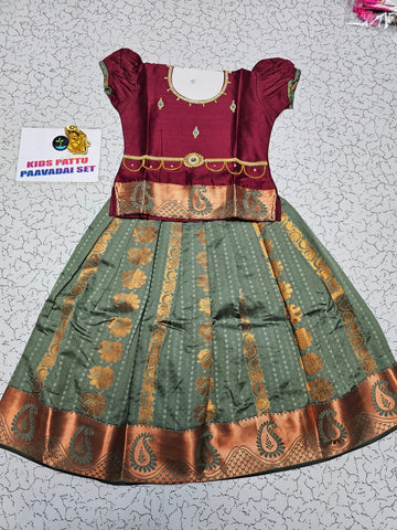 Kids maroon semi silk top with olive green emboss skirt pattu pavadai – Sri Thulir Tex