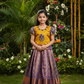 Kids pattu pavadai set with mustard yellow top and purple bridal silk skirt from Sri Thulir Tex