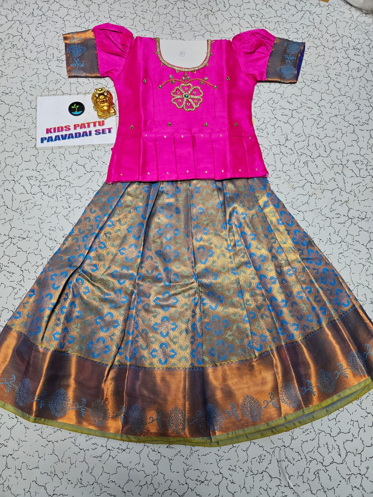 Kids pattu pavadai set with pink semi-silk top and blue bridal silk skirt from Sri Thulir Tex