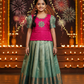 Kids pattu pavadai set with pink stone work blouse and green silk skirt by Sri Thulir Tex
