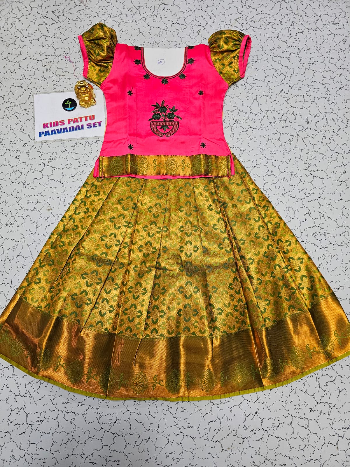 Kids pink and green pattu pavadai set with puff sleeve blouse and zari silk skirt from Sri Thulir Tex