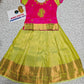 Kids pink and lemon green pattu pavadai set with puff sleeves and zari woven silk skirt from Sri Thulir Tex