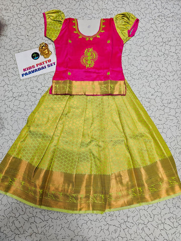 Kids pink and lemon green pattu pavadai set with puff sleeves and zari woven silk skirt from Sri Thulir Tex