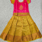 Kids pink and mustard gold pattu pavadai set with puff sleeves and zari woven silk skirt from Sri Thulir Tex
