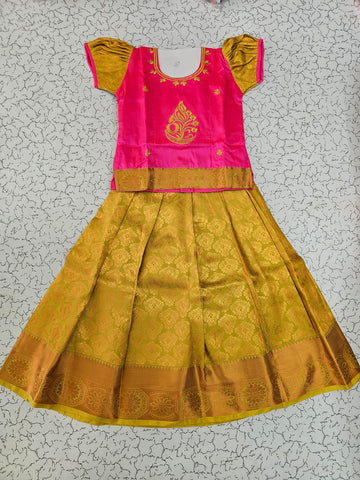 Kids pink and mustard gold pattu pavadai set with puff sleeves and zari woven silk skirt from Sri Thulir Tex