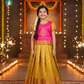 Kids pink and mustard gold pattu pavadai set with puff sleeves and zari woven silk skirt from Sri Thulir Tex