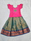 Kids pink semi silk top with peacock green bridal silk pattu pavadai set by Sri Thulir Tex