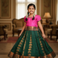 Kids pattu pavadai with pink semi silk top and bottle green emboss skirt – Sri Thulir Tex
