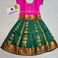 Kids pattu pavadai with pink top and dark green emboss skirt – Sri Thulir Tex
