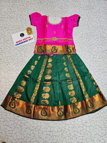 Kids pattu pavadai with pink top and dark green emboss skirt – Sri Thulir Tex