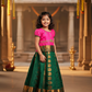 Kids pattu pavadai with pink top and dark green emboss skirt – Sri Thulir Tex
