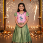 Kids pattu pavadai set with pink top and green silk skirt from Sri Thulir Tex