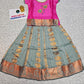 Kids Pattu Pavadai set with pink top and light green zari woven skirt from Sri Thulir Tex.