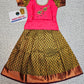 Kids Pattu Pavadai set with pink stone-work top and mustard green zari woven skirt from Sri Thulir Tex.