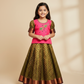 Kids Pattu Pavadai set with pink stone-work top and mustard green zari woven skirt from Sri Thulir Tex.