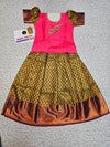 Kids Pattu Pavadai set with pink stone-work top and olive green zari woven skirt from Sri Thulir Tex.
