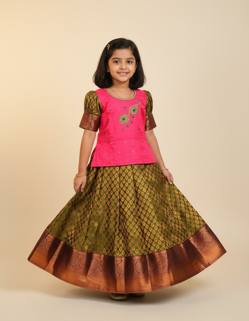 Kids Pattu Pavadai set with pink stone-work top and olive green zari woven skirt from Sri Thulir Tex.