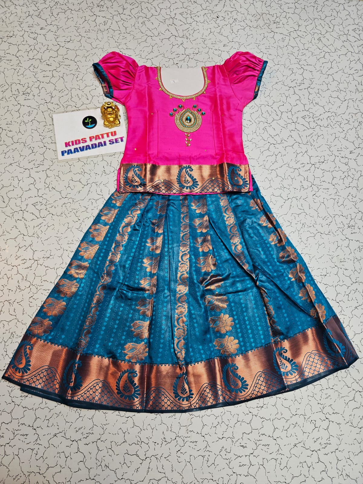 Kids pink top and peacock blue emboss skirt pattu pavadai set – Sri Thulir Tex