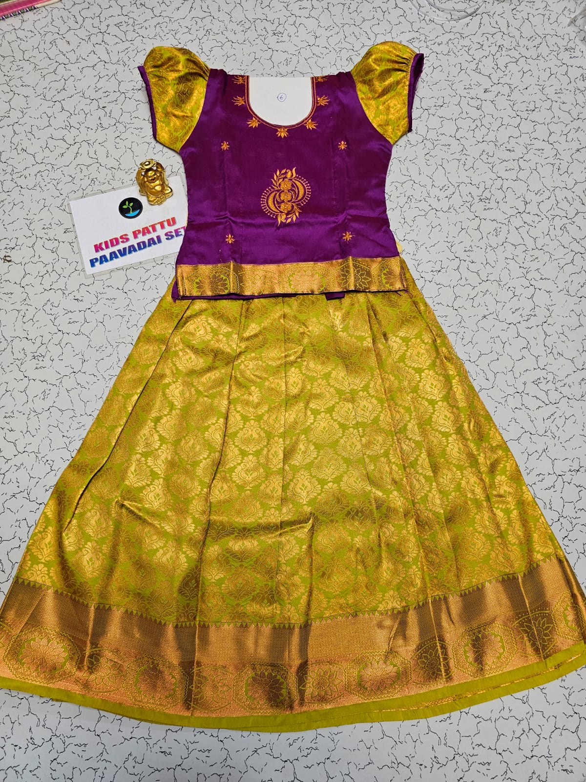 Kids pattu pavadai set with purple top and yellow bridal silk skirt by Sri Thulir Tex