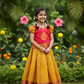 Kids pattu pavadai set with red semi-silk top and mustard gold bridal silk skirt by Sri Thulir Tex