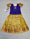 Kids Pattu Pavadai set with royal blue stone-work top and golden zari woven skirt from Sri Thulir Tex.