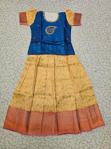 Kids pattu pavadai set with blue semi silk top and cream bridal silk skirt by Sri Thulir Tex