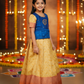Kids pattu pavadai set with blue semi silk top and cream bridal silk skirt by Sri Thulir Tex