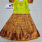 Kids pattu pavadai set with green semi silk top and gold bridal silk skirt by Sri Thulir Tex
