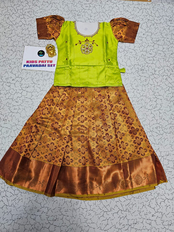 Kids pattu pavadai set with green semi silk top and gold bridal silk skirt by Sri Thulir Tex