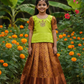 Kids pattu pavadai set with green semi silk top and gold bridal silk skirt by Sri Thulir Tex