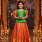 Kids pattu pavadai set with green semi silk top and orange bridal silk skirt by Sri Thulir Tex