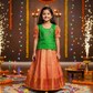 Kids pattu pavadai set with green semi silk top and peach-gold bridal silk skirt by Sri Thulir Tex