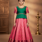 Kids green and pink pattu pavadai set with silk skirt and embroidered stonework blouse