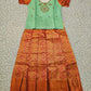 Kids pattu pavadai set with mint green semi silk top and orange bridal silk skirt by Sri Thulir Tex