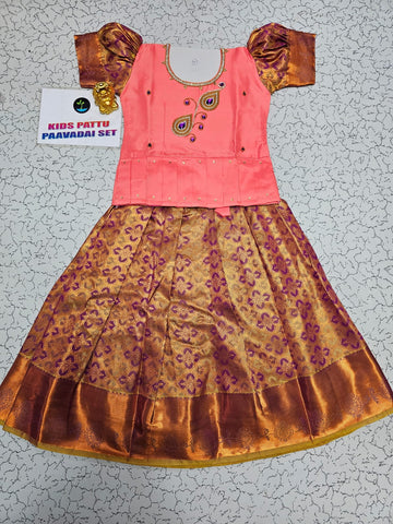 Kids pattu pavadai set with peach semi silk top and gold bridal silk skirt by Sri Thulir Tex