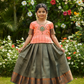 Kids pattu pavadai set with peach semi silk top and green bridal silk skirt by Sri Thulir Tex