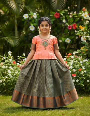 Kids pattu pavadai set with peach semi silk top and green bridal silk skirt by Sri Thulir Tex