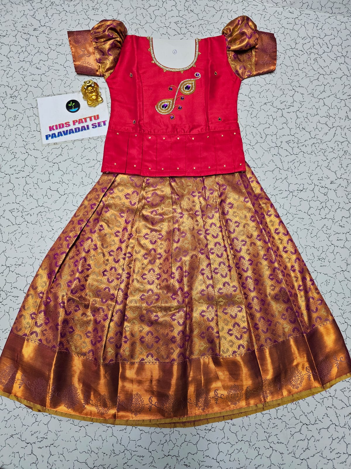 Kids pattu pavadai set with pink semi silk top and gold bridal silk skirt by Sri Thulir Tex